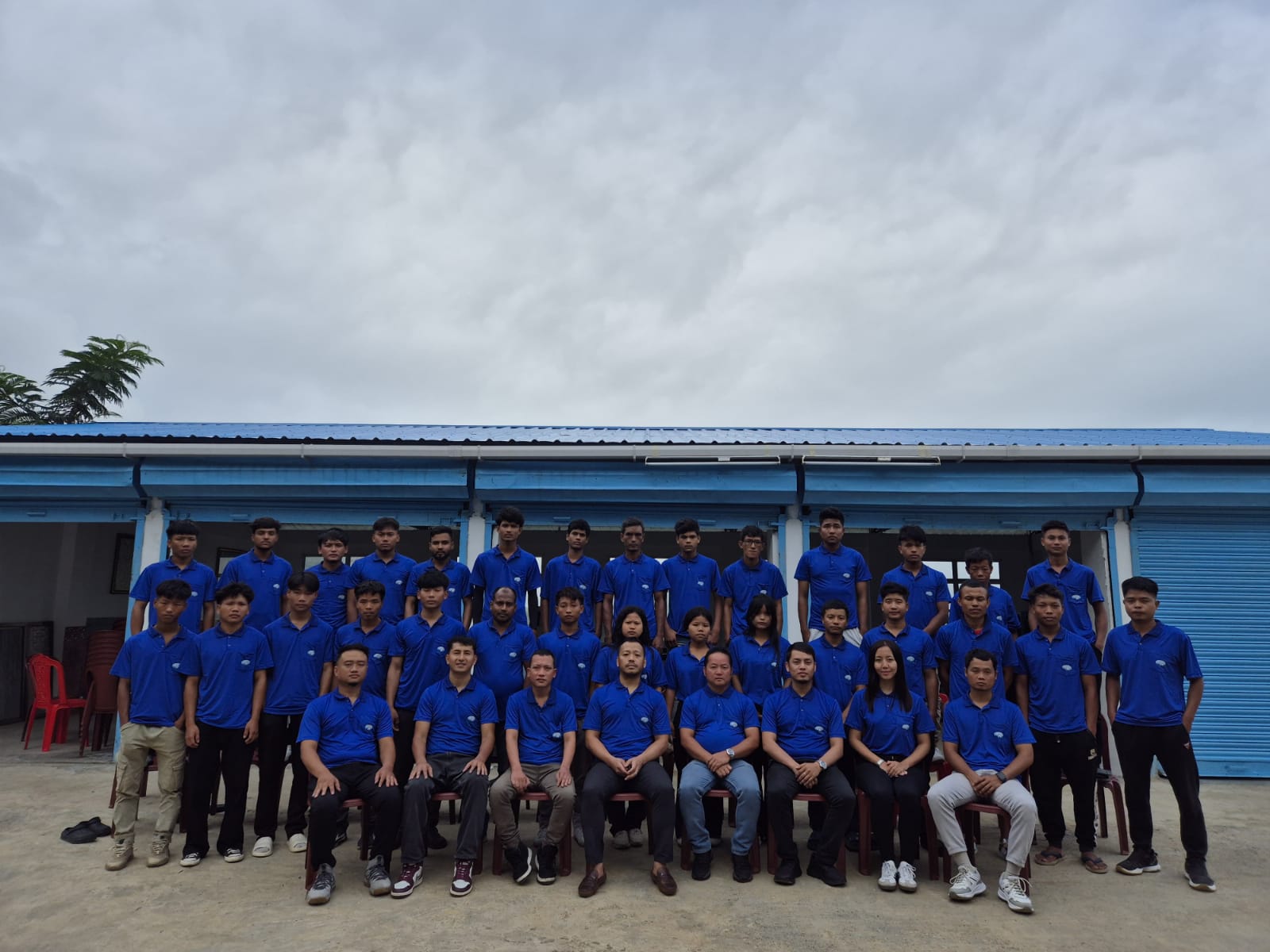The full F Hrangvela Industry team outside the Aizawl workshop